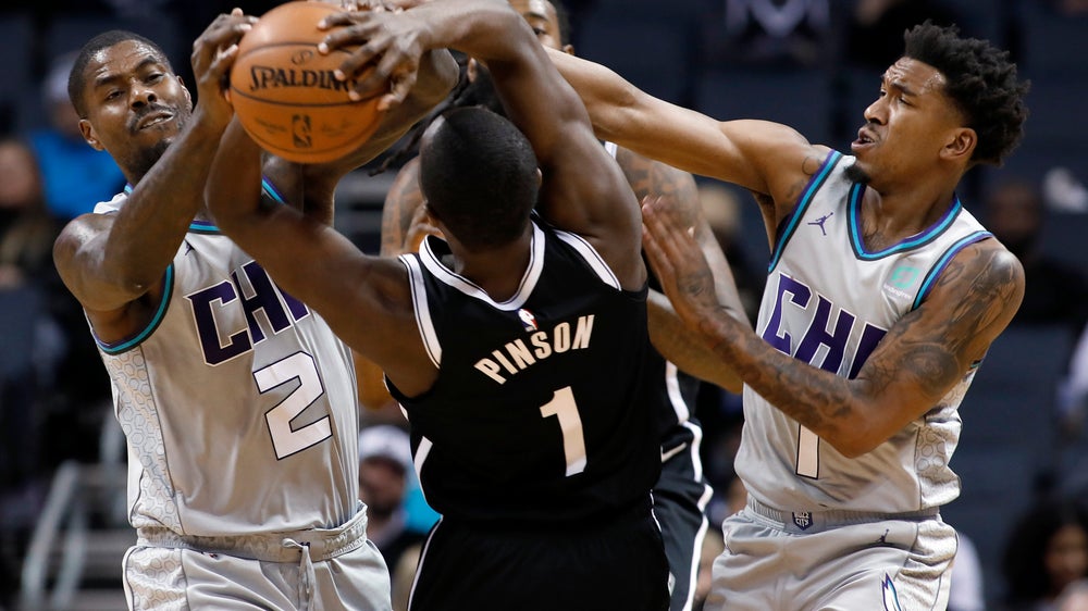 Harris, Jordan lead Nets past Hornets, 111-104
