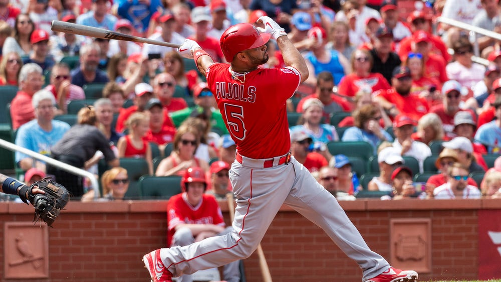Pujols homers in return to St. Louis; Cards beat Angels 4-2