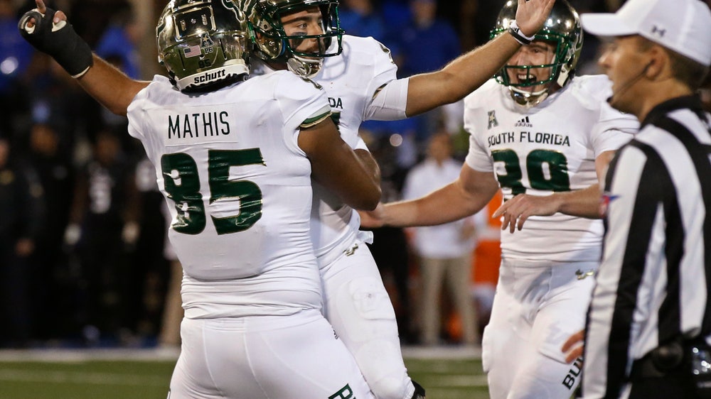 No. 23 USF rallies to beat Tulsa 25-24 to remain unbeaten