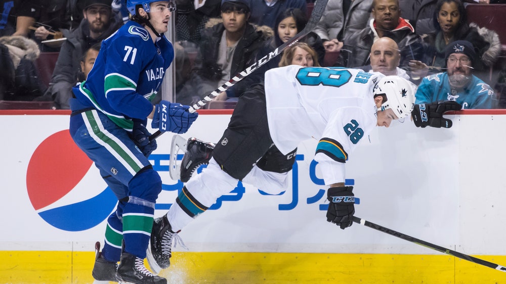 Kane scores twice, Sharks rout Canucks 7-2