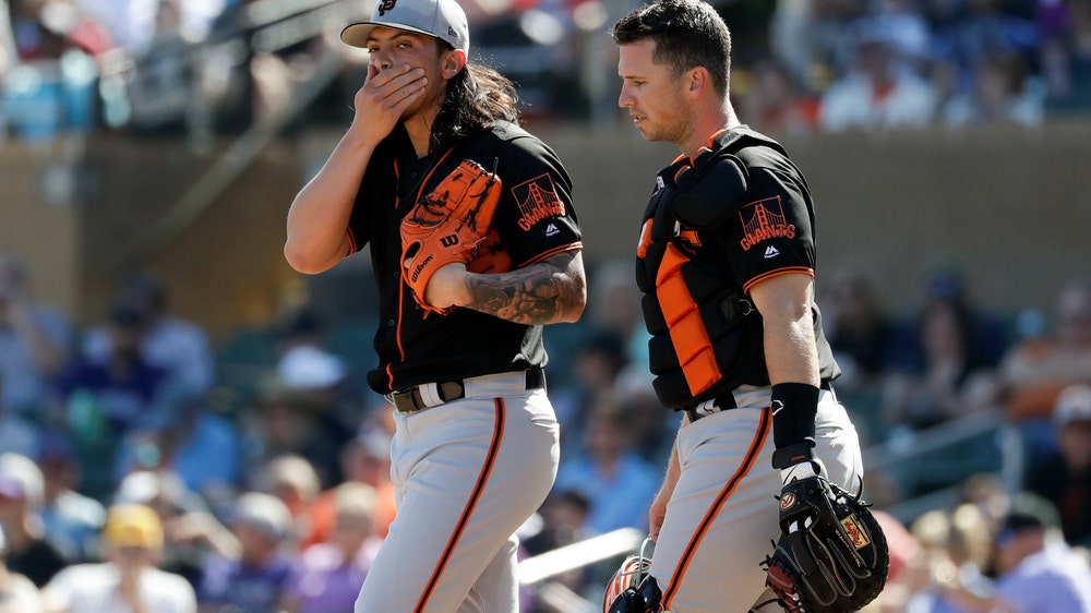 Giants' Posey catching more in spring than expected