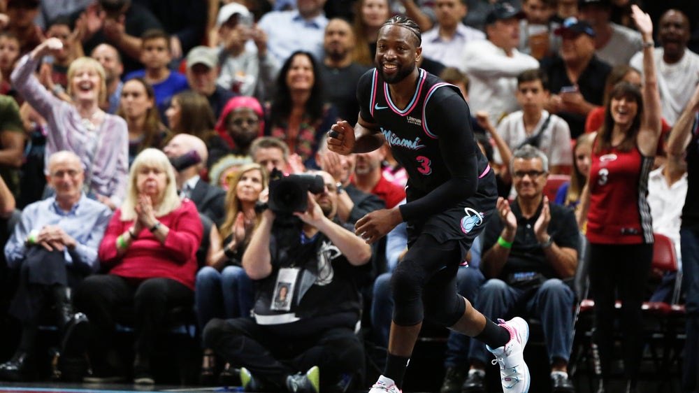 Dwyane Wade banks in 3-pointer to lift Heat past Warriors