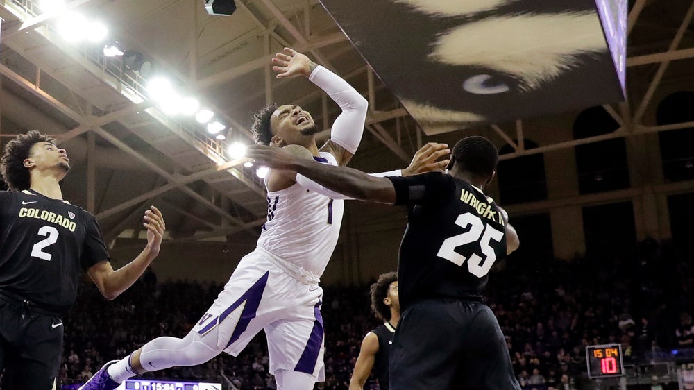 Washington earns share of Pac-12 title, beats Colorado 64-55