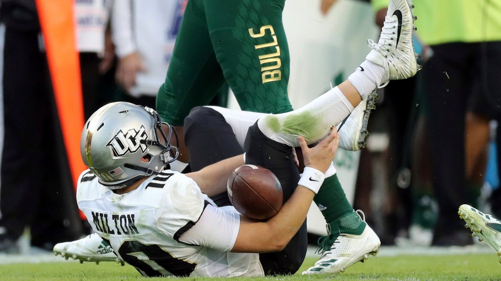QB Milton injured. No. 8 UCF remains unbeaten