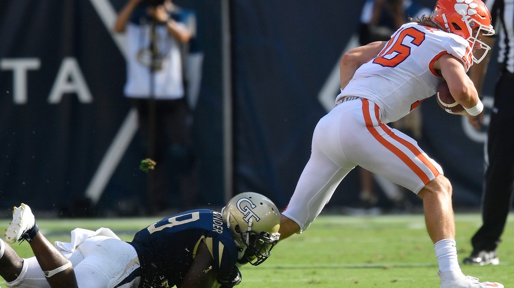Lawrence throws 4 TDs, No. 3 Clemson routs Ga Tech 49-21