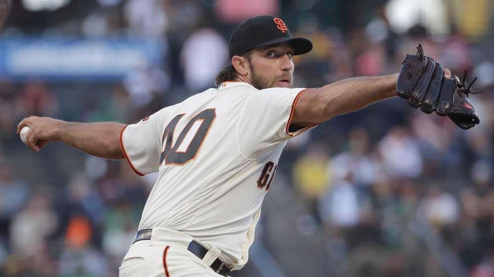 Bumgarner pitches Giants past Athletics in Bay Bridge Series