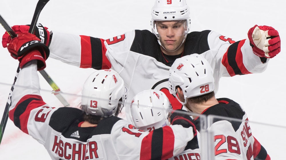 Palmieri scores in OT, Devils beat Canadiens 4-3