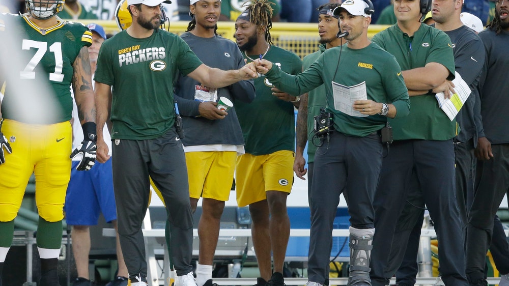 Rodgers held out of preseason game with back tightness