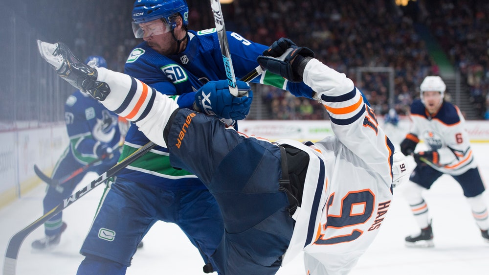 Quinn scores power-play goal as Canucks beat Oilers 4-2