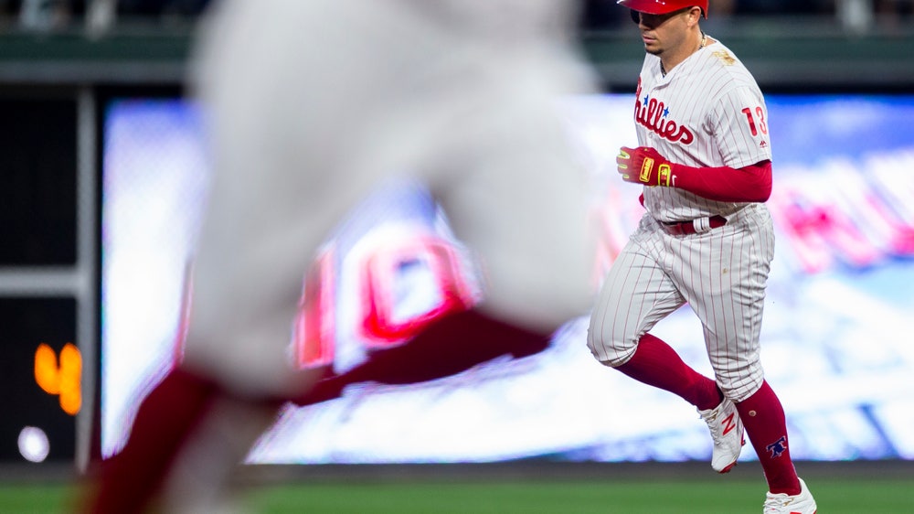 Santana, Eflin lead Phillies past Marlins