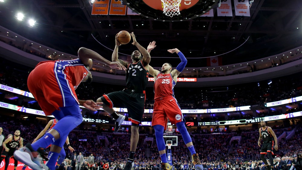 Lowry has big half amid trade rumors, Raptors hold off 76ers