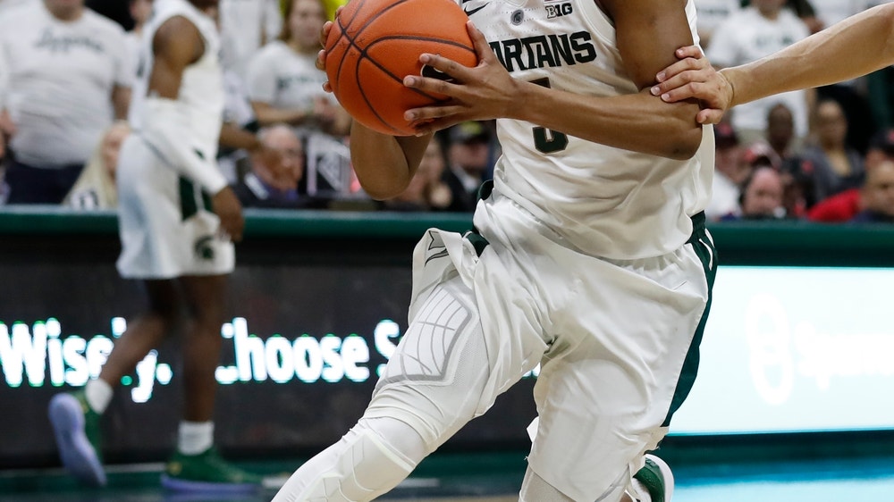 Big Ten lead at stake in 1st Michigan-Michigan St matchup