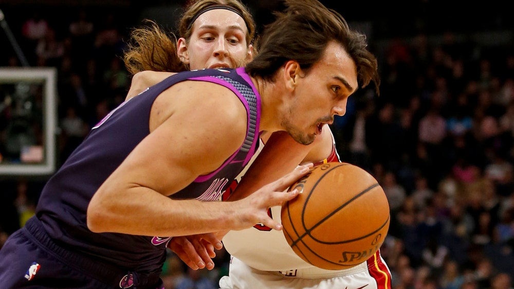 Wolves beat Heat 111-109 as Wade’s shot misses at buzzer