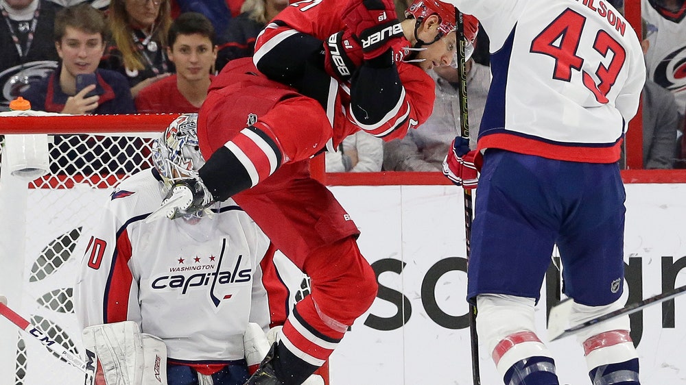 Capitals beat Hurricanes 3-2 to clinch playoff spot