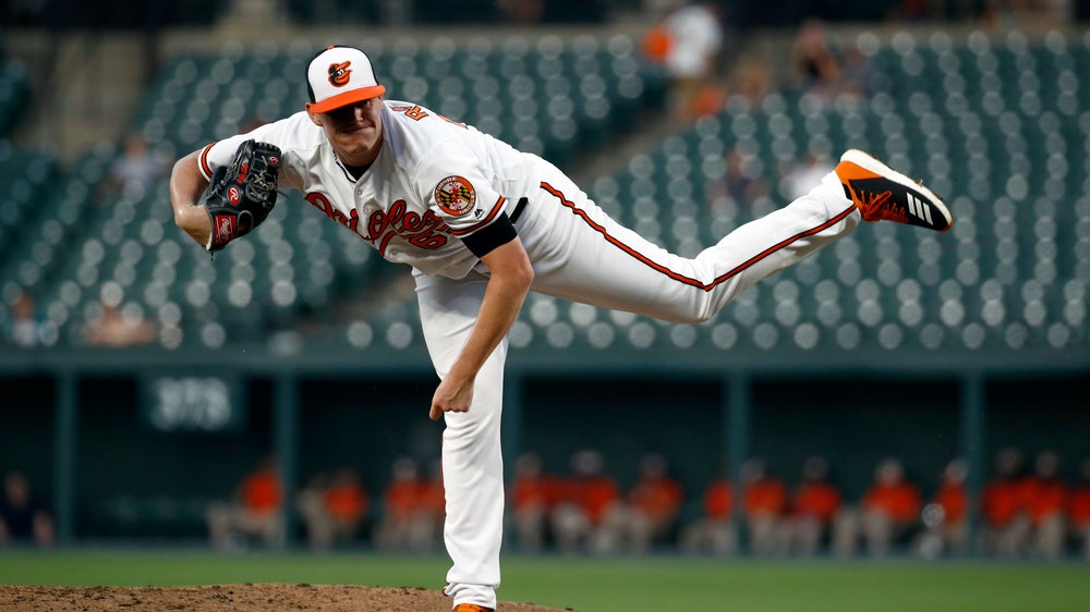 Rogers wins major league debut, Orioles top Blue Jays 12-5