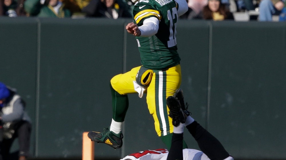 Packers beat sliding Falcons 34-20, 1st win under Philbin