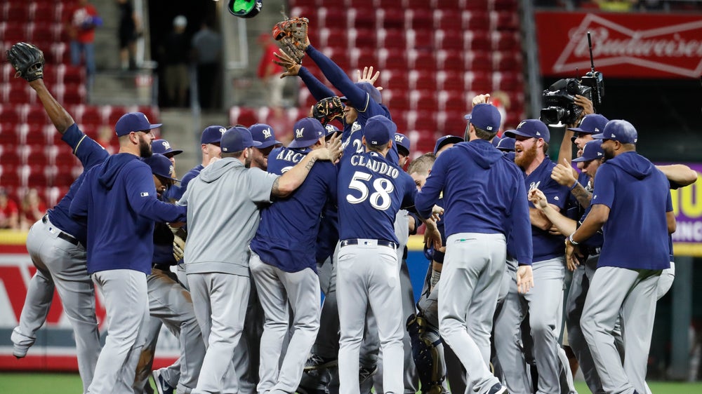 Brewers clinch playoff spot; Twins win AL Central