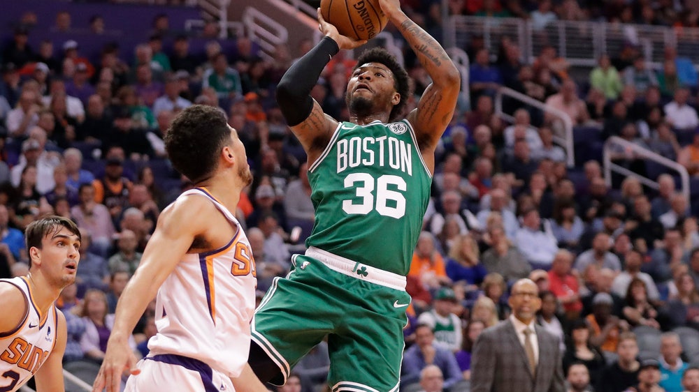 Tatum scores 26 to lead Celtics over Suns 99-85