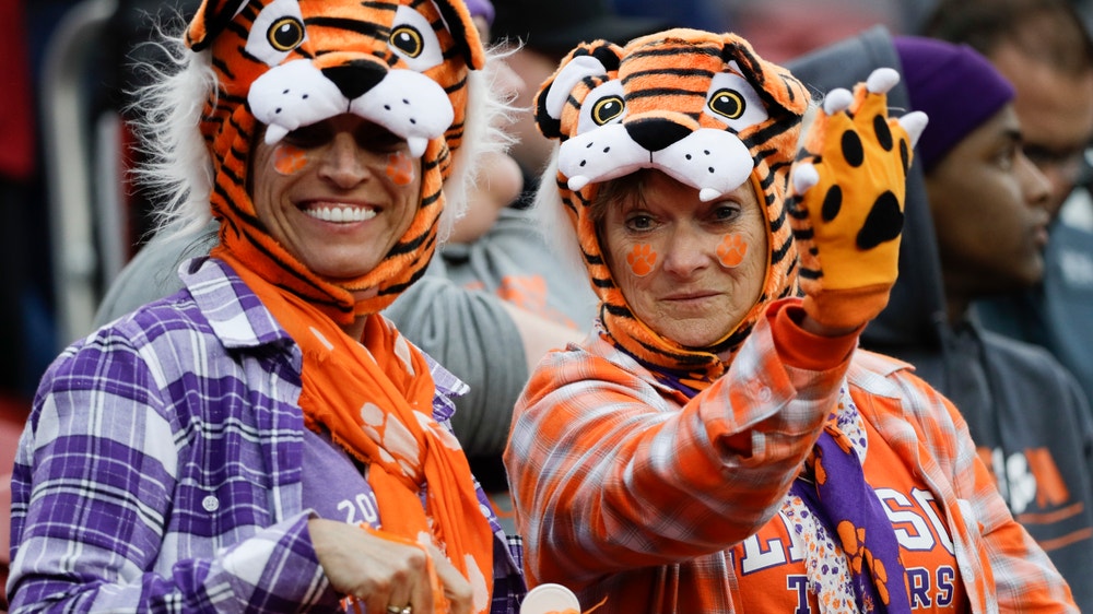 The Latest: Nikki Haley on Tigers sideline before title game