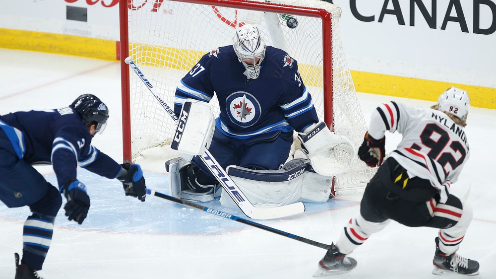 Kane has goal, 3 assists in Blackhawks' 4-1 win over Jets