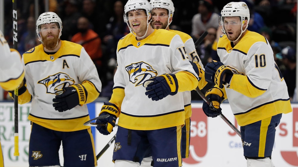 Predators score 7 straight goals, beat Islanders 8-3