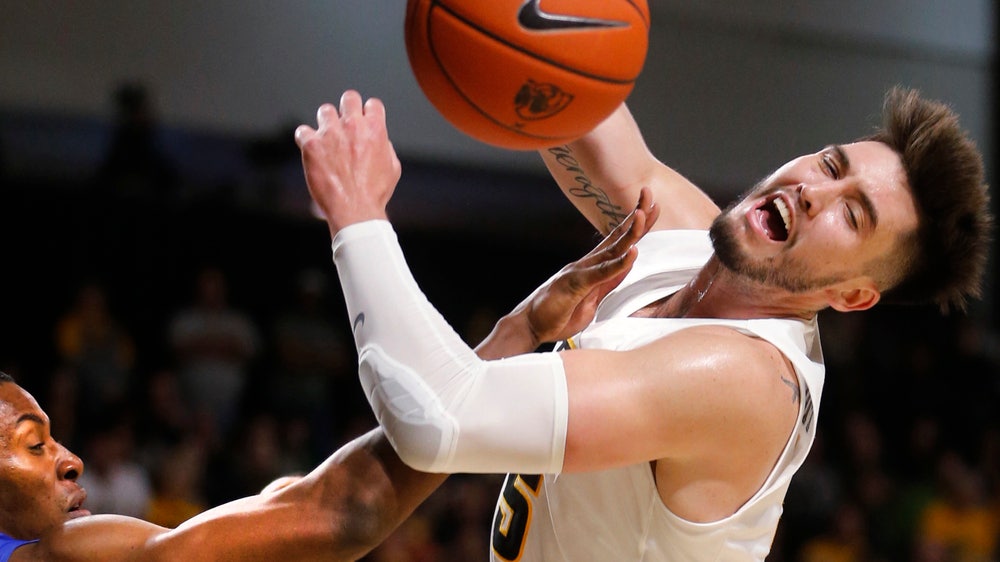 VCU holds off Hampton 69-57 behind Santos-Silva