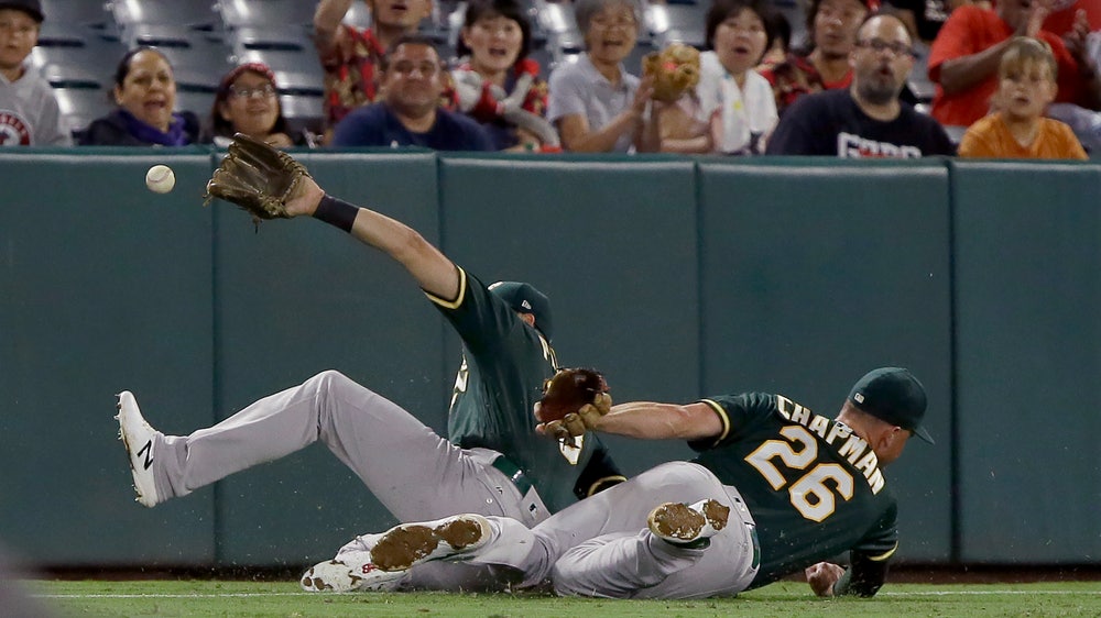A's lose to Angels, lead over Rays down to half-game