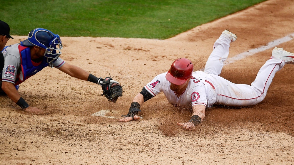Trout homers, Angels rally for 6 in 7th to edge Rangers 7-6