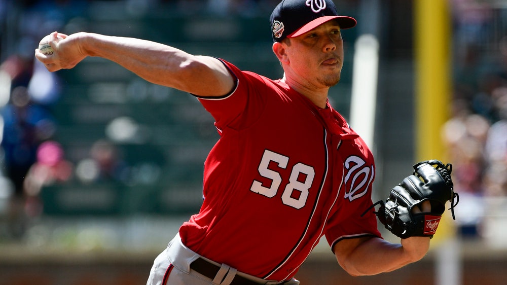 Hellickson leaves after reinjuring wrist while batting