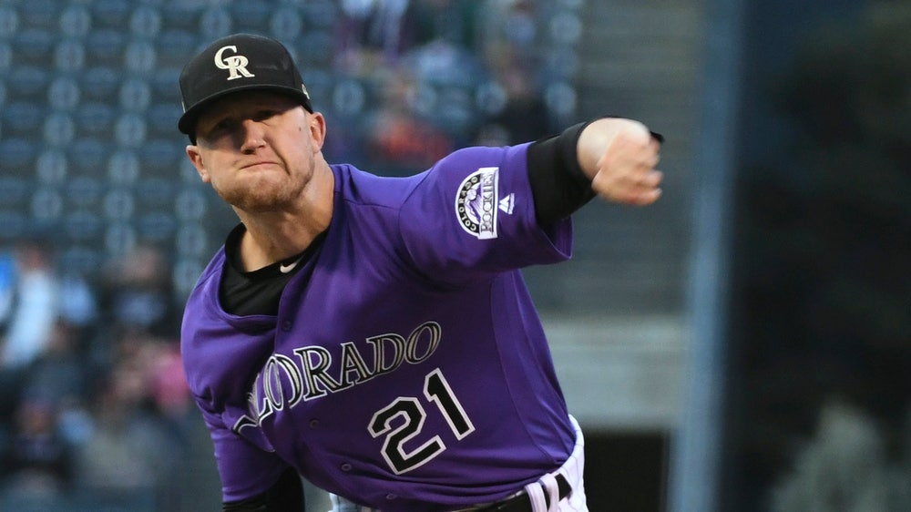 NL West-leading Rox win 8th straight to clinch playoff spot