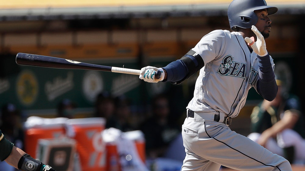 Gordon breaks scoreless tie with HR in 12th, M’s top A’s 2-0