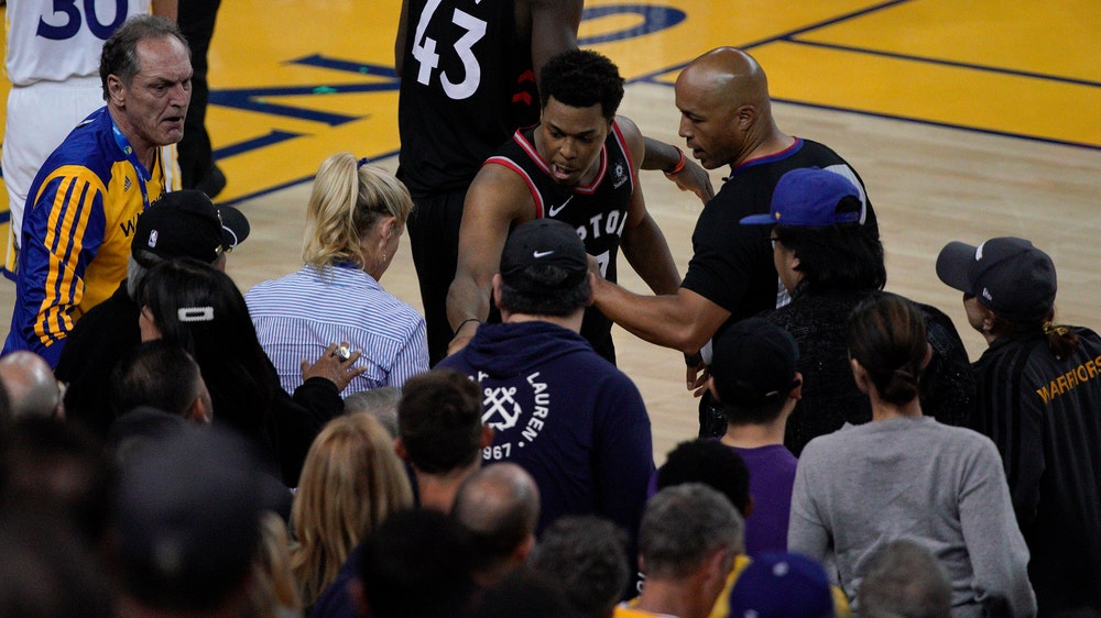 The Latest: Warriors say team investor shoved Kyle Lowry