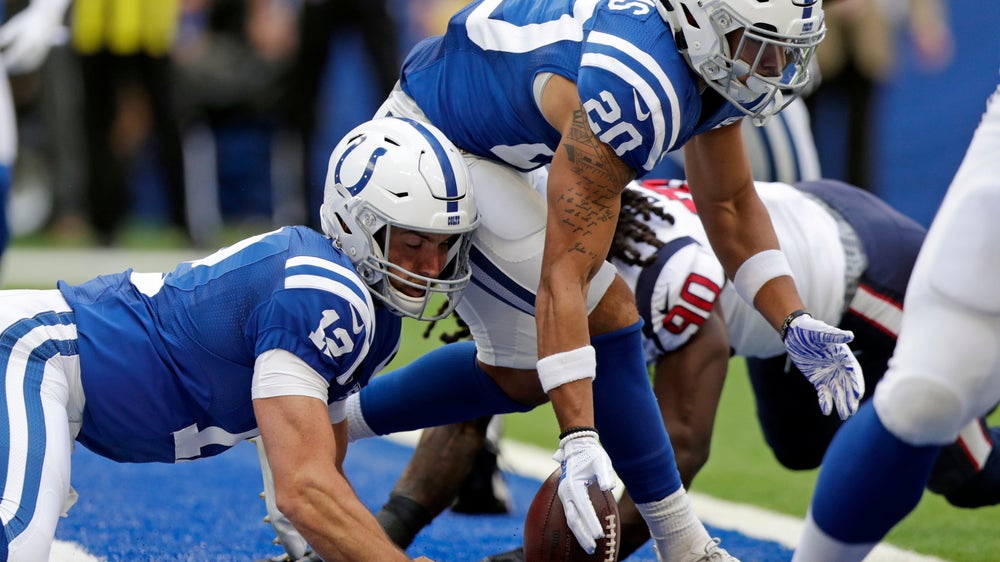 Texans end losing streak in OT after Vinatieri sets record