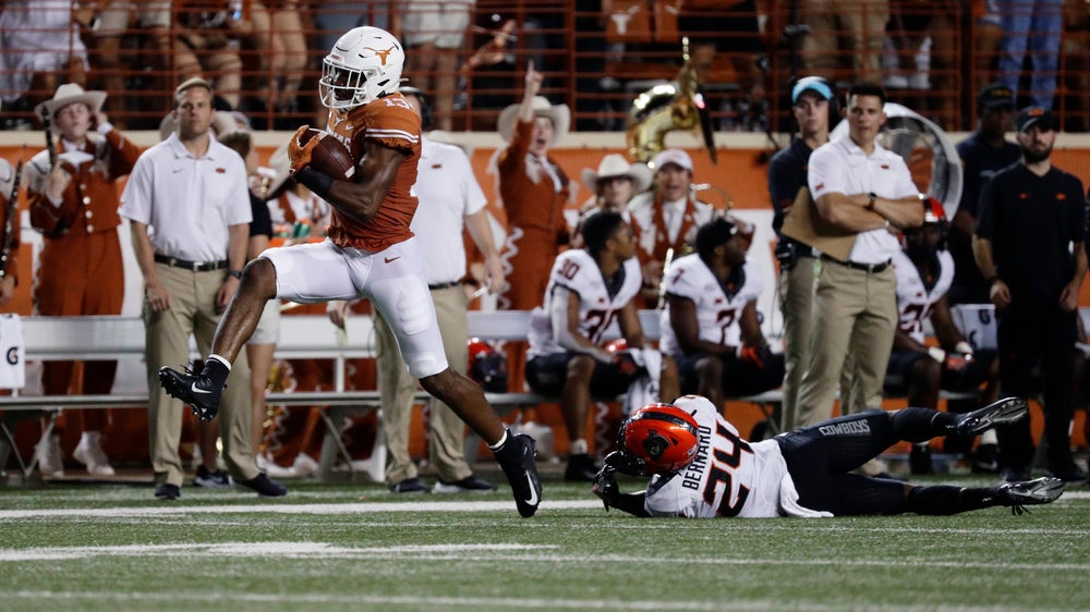 Ehlinger leads No. 12 Texas past Oklahoma State 36-30