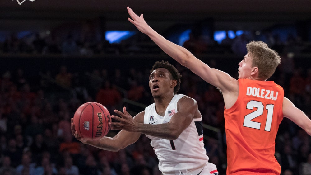 Connecticut upsets No. 15 Syracuse behind Adams and Gilbert