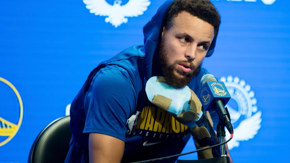 Curry hopes to return from broken hand 'in early spring'