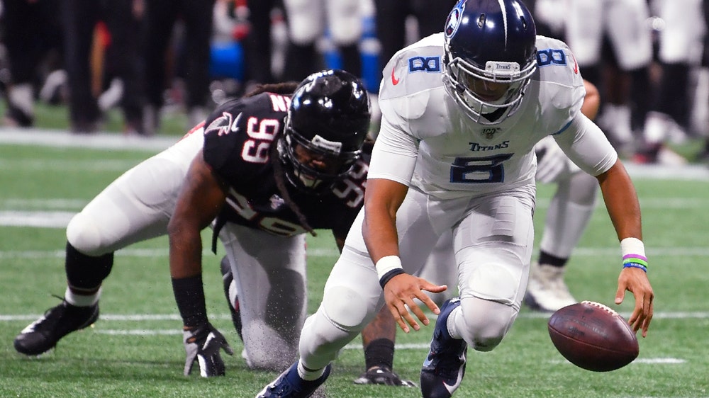 Mariota throws 3 first-half TD passes, Titans drop Falcons