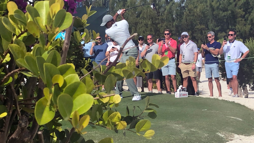 Woodland leads in the Bahamas as Tiger gets within 2 shots
