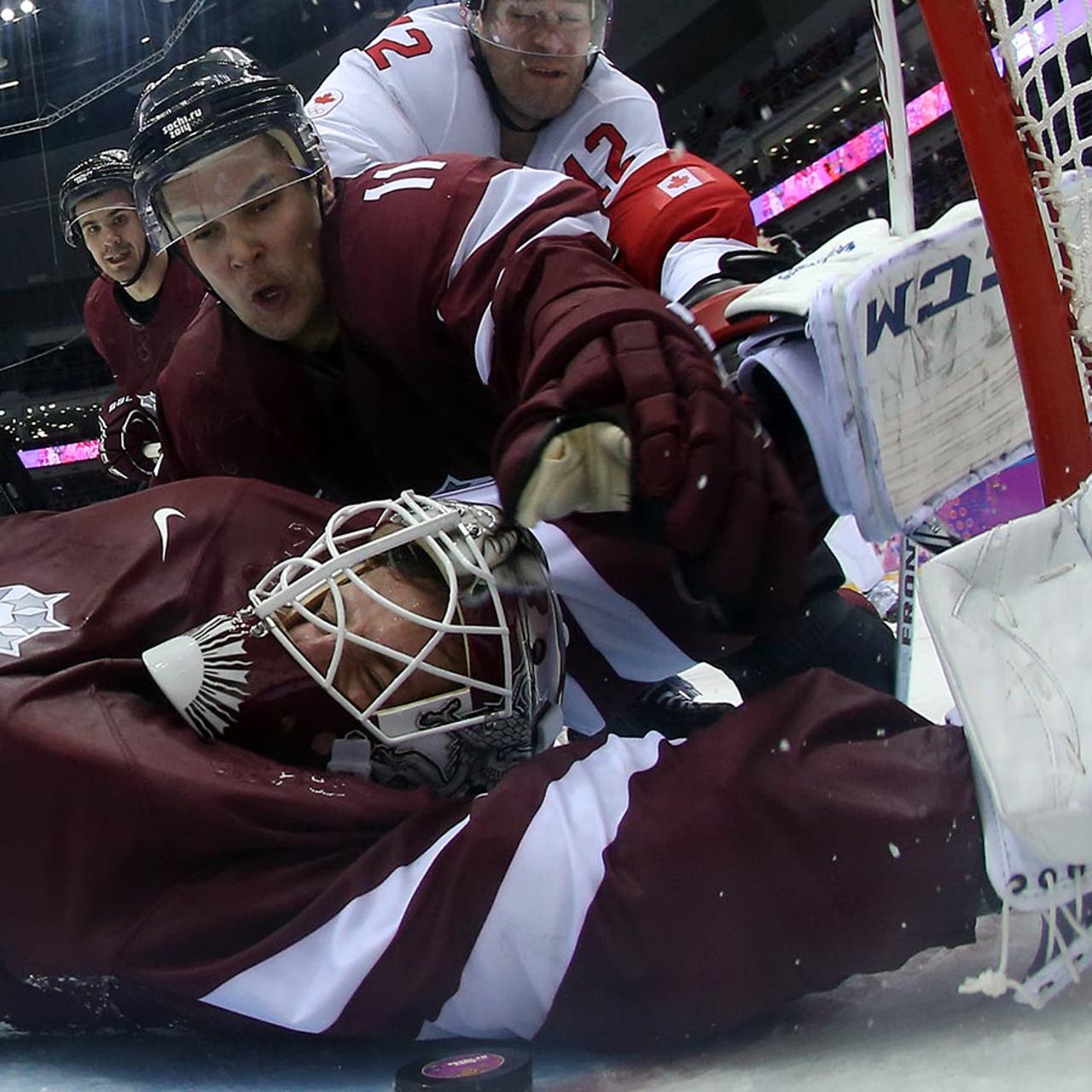 Photos Latvia goalie was busiest athlete in Sochi on Wednesday