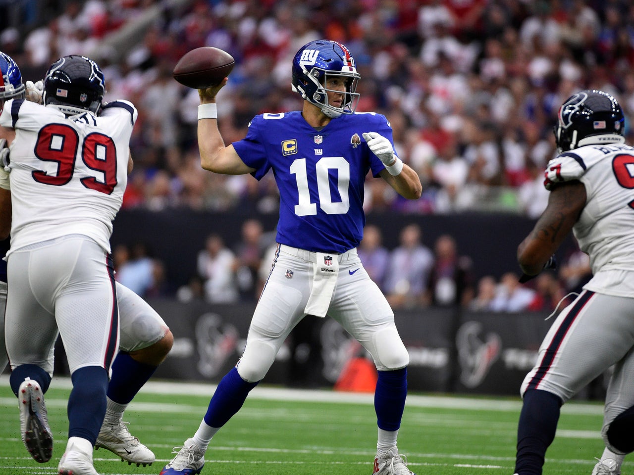 Comparing Peyton and Eli Manning Super Bowl performances - Red Cup