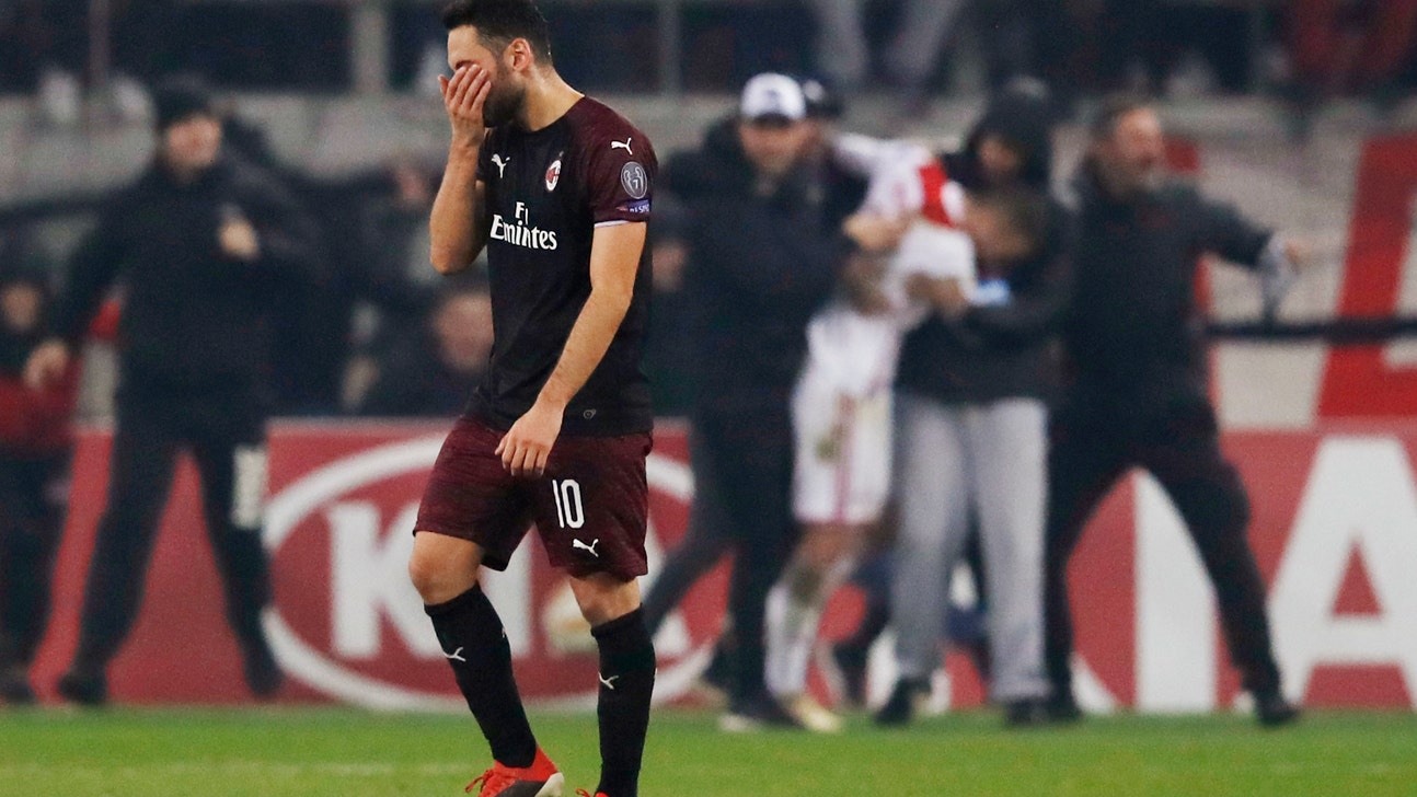UEFA fines Milan $13M, threatens 1-year European ban