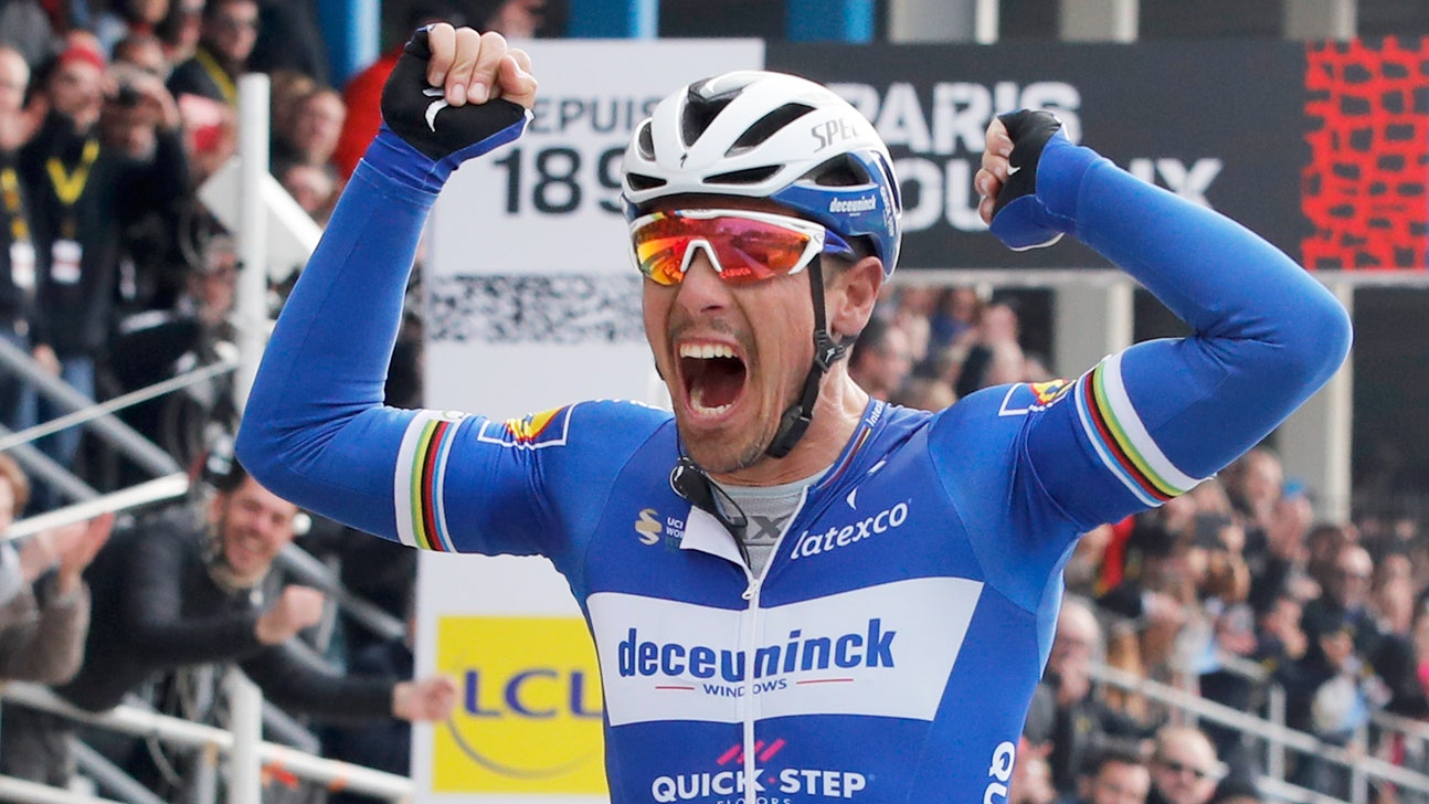 Belgian veteran Gilbert beats Politt to win Paris-Roubaix