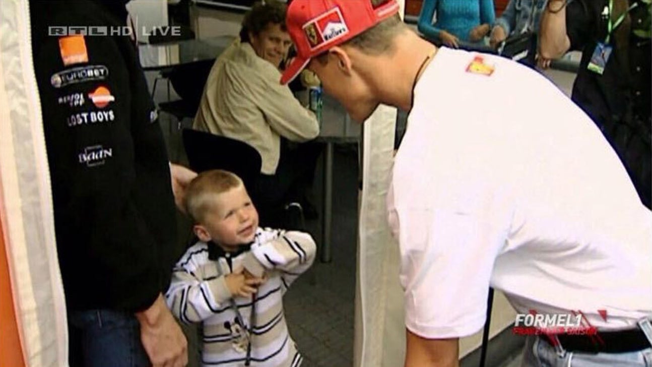 Here's Michael Schumacher meeting a baby Max Verstappen
