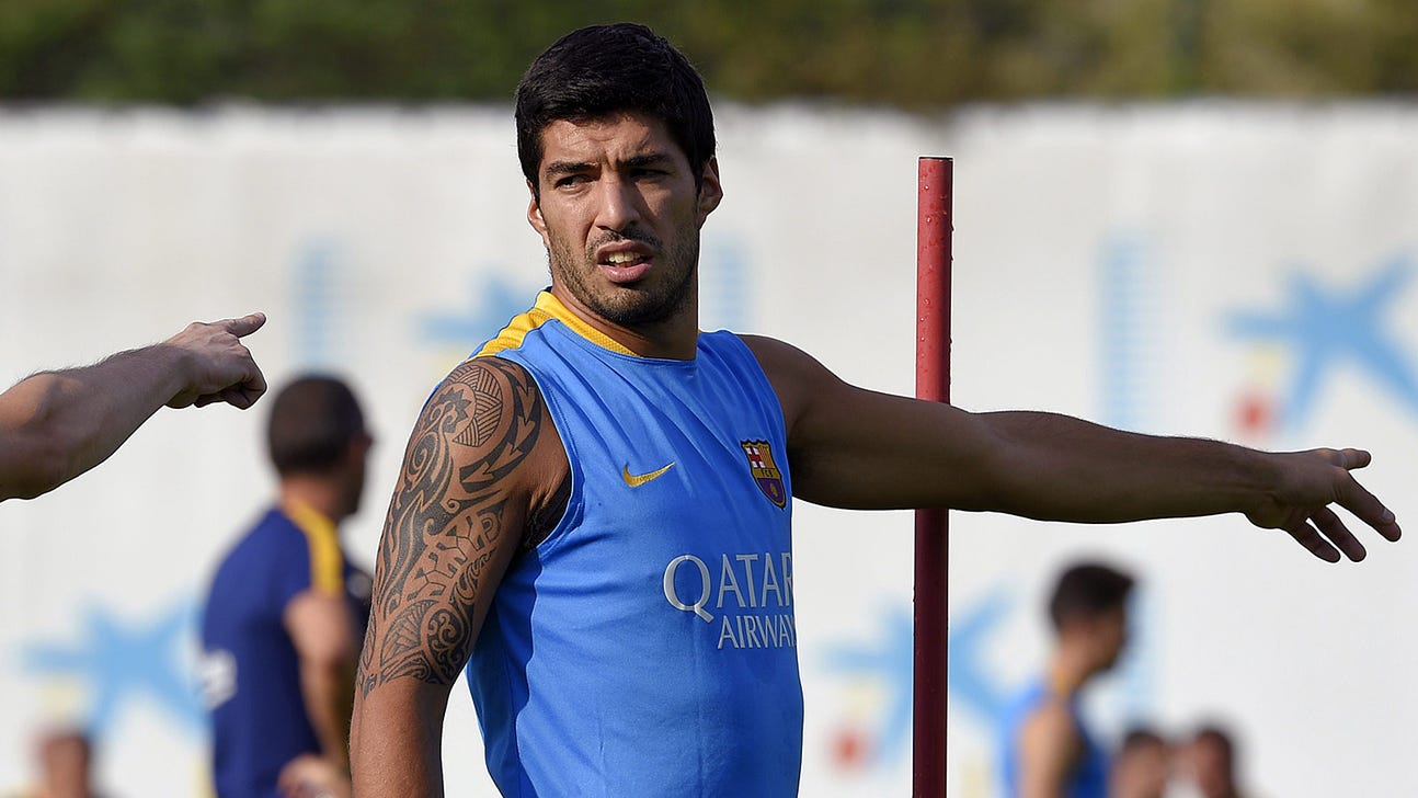 Kid tells Barcelona's Luis Suarez that he is the best, Suarez corrects him
