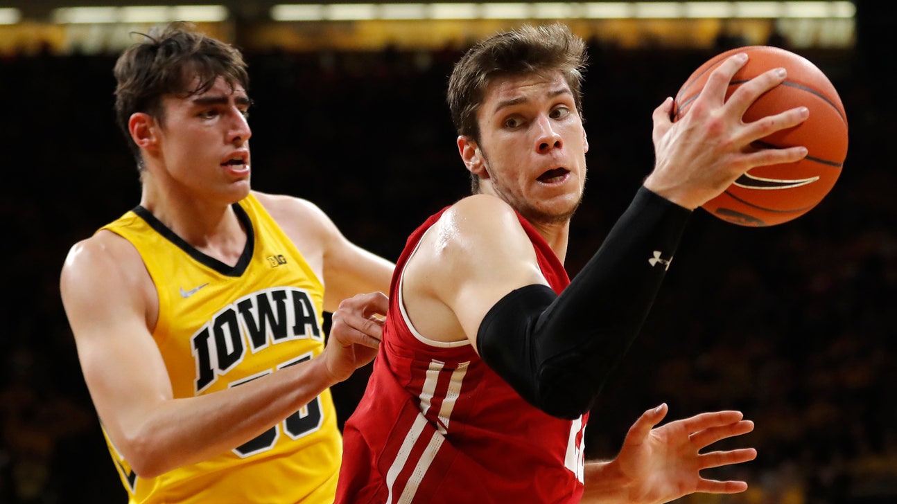 Trice, No. 22 Wisconsin win at No. 14 Iowa 72-66