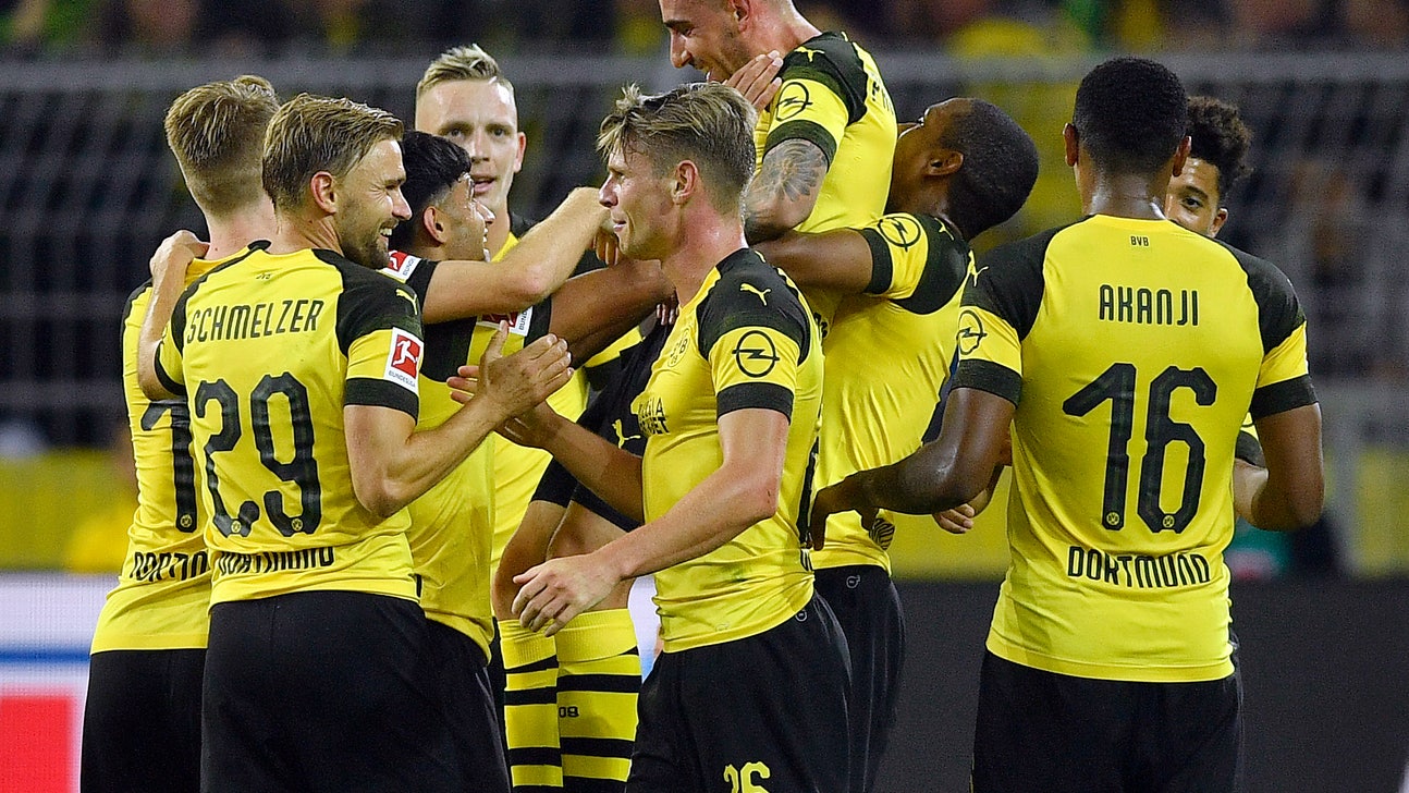 Alcacer stars in debut, seals Dortmund’s 3-1 win in Germany