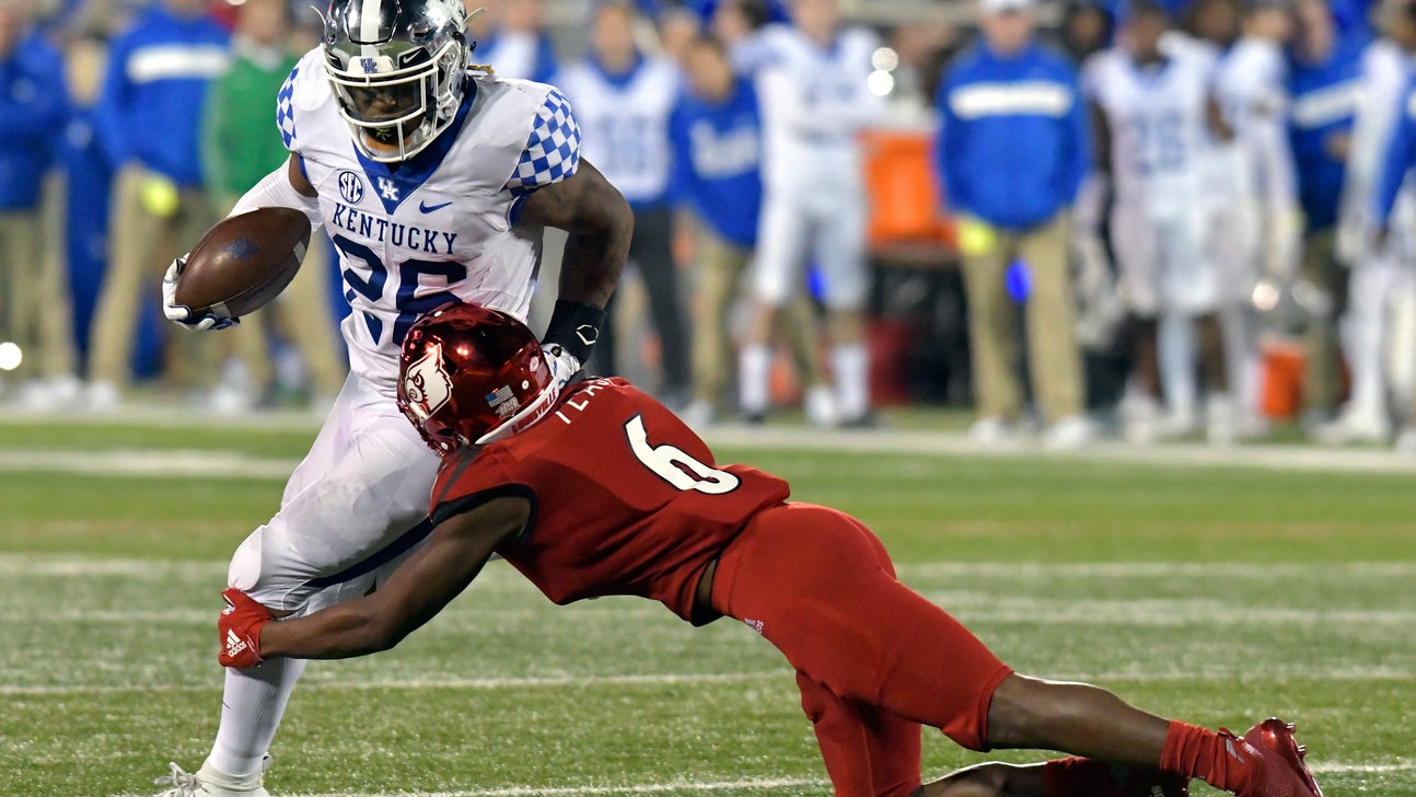 No. 17 Kentucky blows out archrival Louisville 56-10