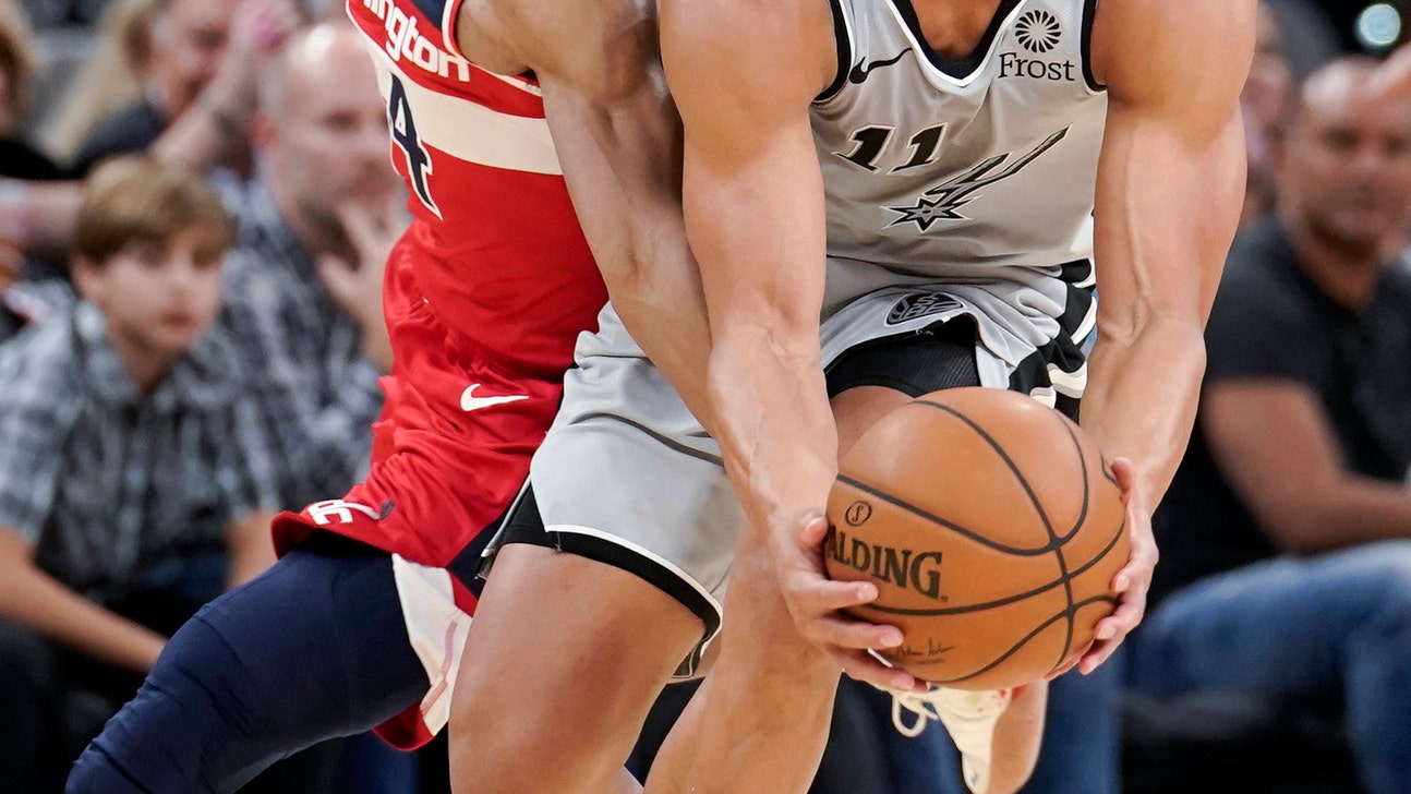 DeRozan's late shot sends Spurs to 124-122 win over Wizards