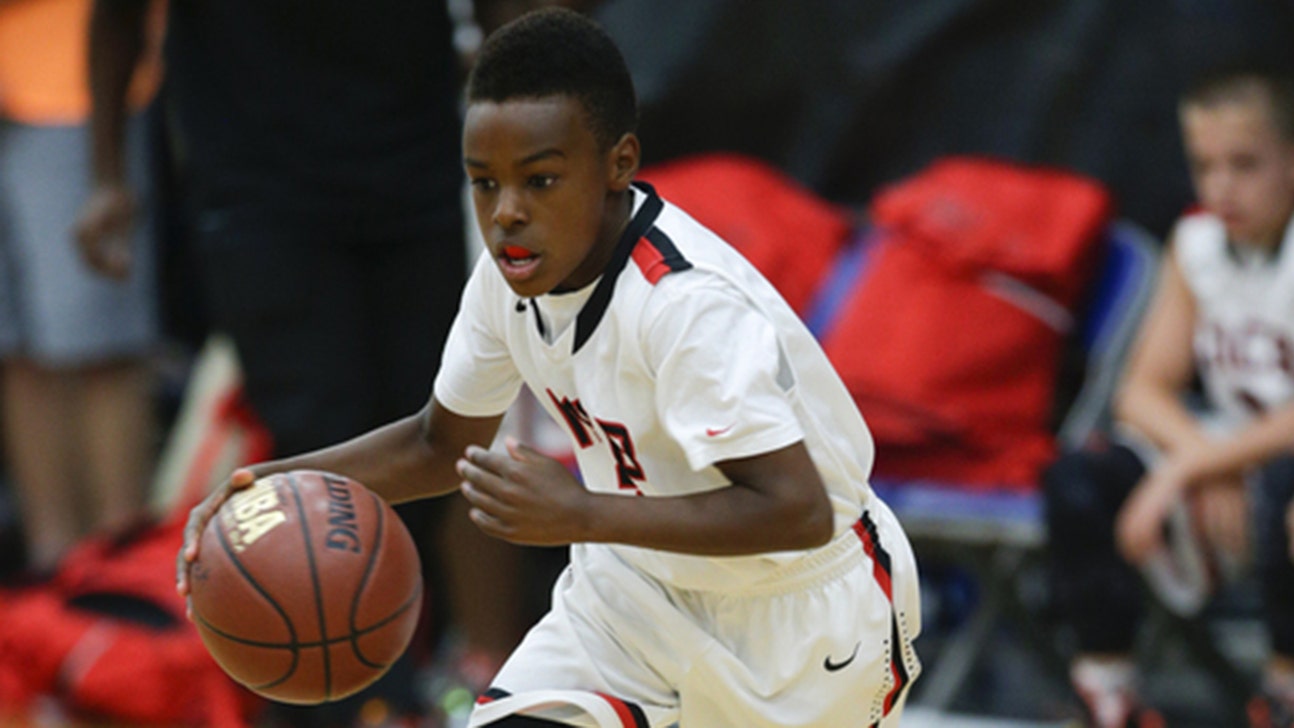 WATCH: LeBron's 10-year-old son makes one-handed halfcourt shot (Video)