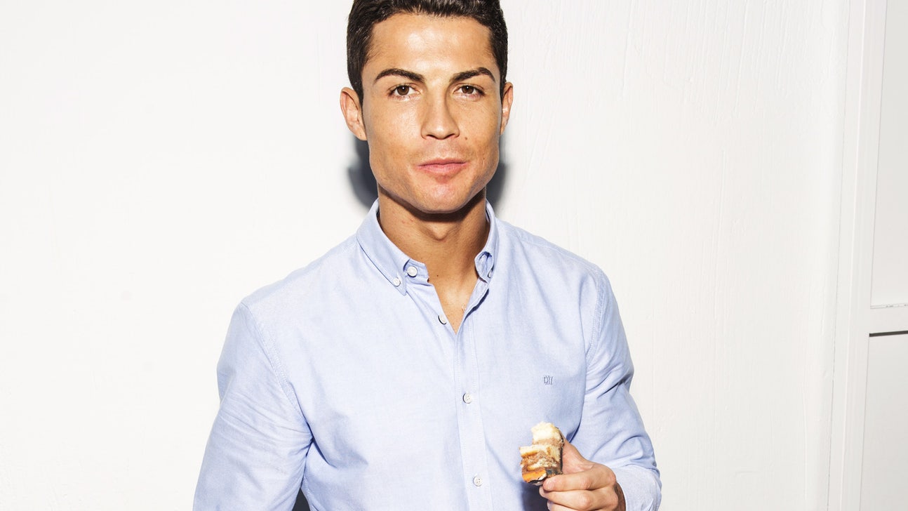 Here's Cristiano Ronaldo eating a CR7 underwear cake...